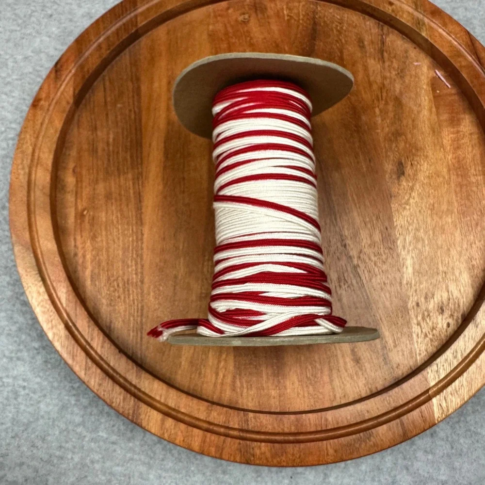 Red and White Braided Flat Cord Trim Spool for Sewing and Crafts